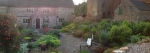 An English Herb Garden with the prior's house at top, just right of center, and the ruined church right of that